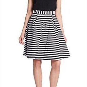 The vanity room black and white skirt